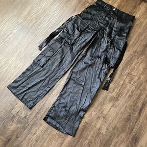 Black satin cargo pants.